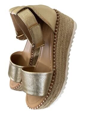 Y-Not Tuckin Platform Wedges in a metallic light gold finish.Size 6.5